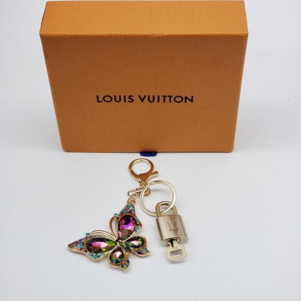 Authentic Louis Vuitton Gold Lock & Box w/ Unbranded Butterfly Bagcharm 121825